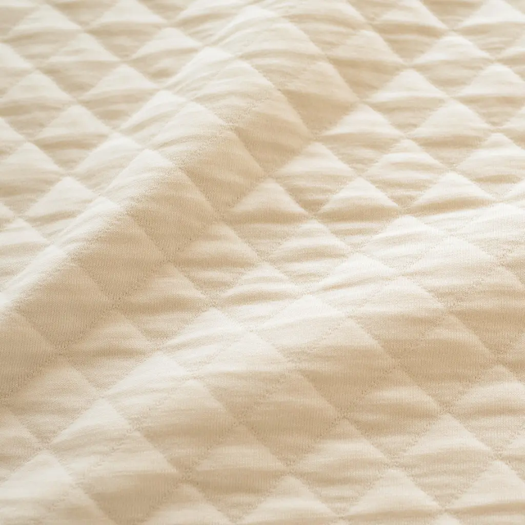 MAGIC_BAG_Matelasse_confort_4-12m_QUILT_Cream (4).webp