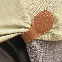 Bruine-magnetische-clips-voor-kinderwagen.webp