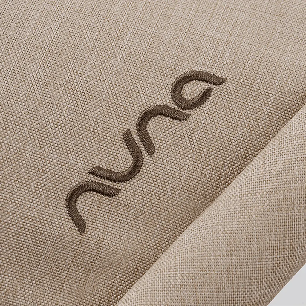 nuna_lytl_cosmopolitan_detail_logo_gl_web.webp