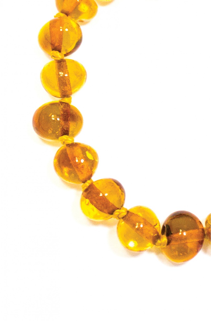 https://lacabanedeslutins.be/wp-content/uploads/2021/02/bracelet-dambre-bebe-perles-rondes-miel-avec-fermoir-securite-3.jpg